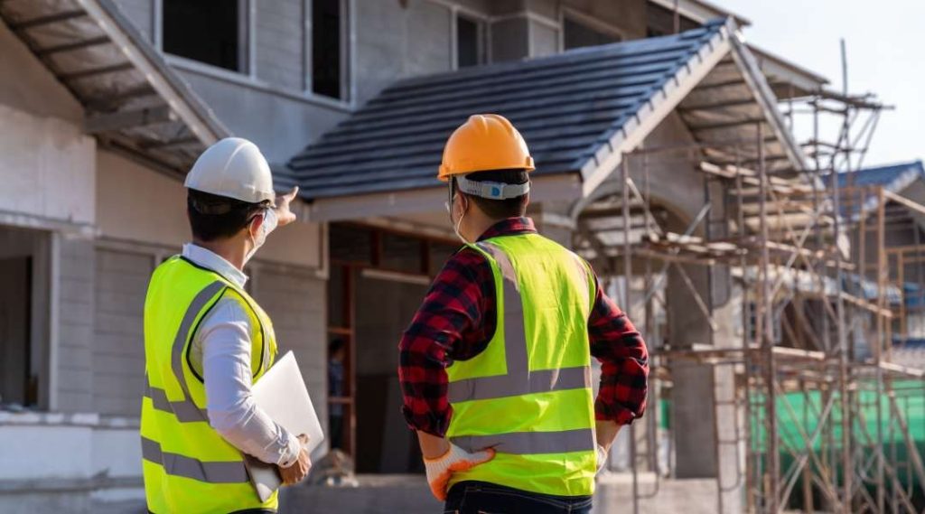 engineer supervising house construction